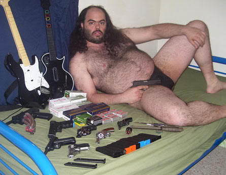 Gun-control_Gun-owners-do-the-funniest-things-Weird-fat-Guy-in-speedo-with-pistols-and-guitars.jpg
